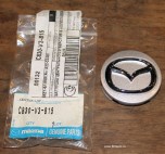 Заглушка центрального отверстия колесного диска Mazda, серебристая.
