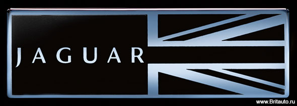 Инталия графитовая в передней части салона Jaguar XJ, рисунок флаг UK - надпись Jaguar